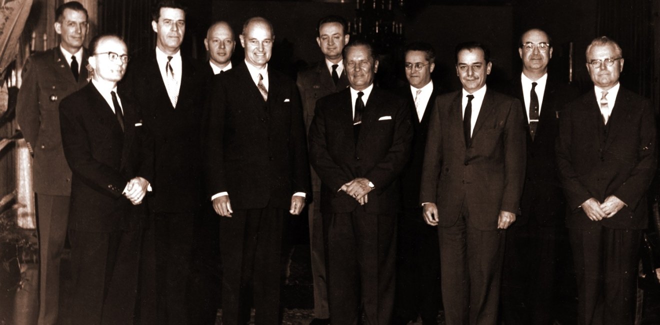 George F. Kennan, American diplomat and historian, posing with others.