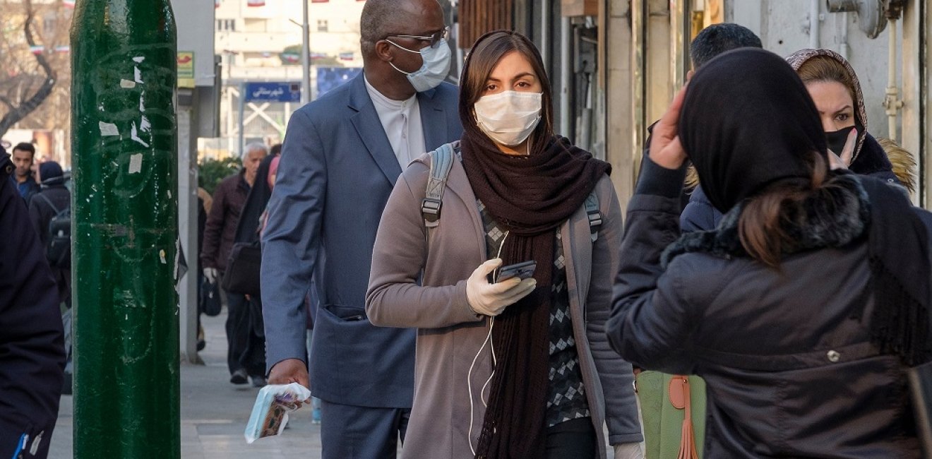 Pedestrians guarding against coronavirus in Iran 