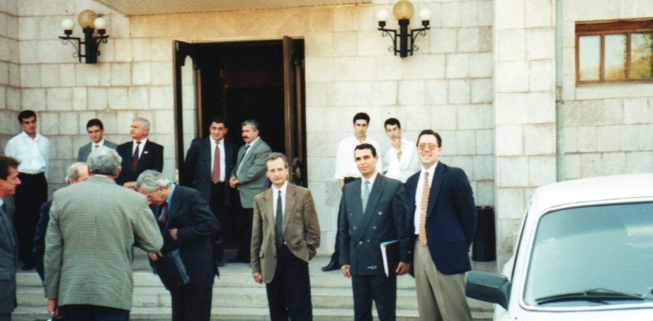 Keays standing with other diplomats 