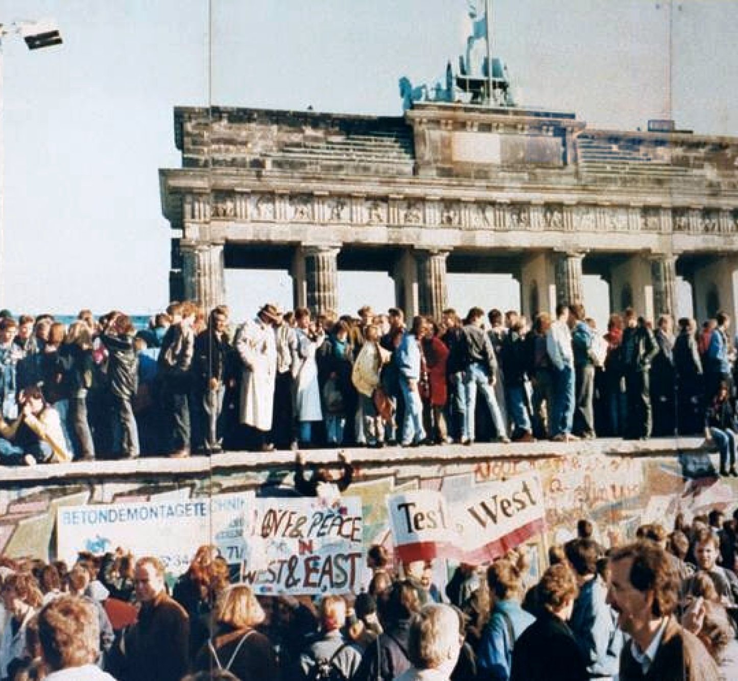 West and East Germans at the Brandenburg Gate in 1989