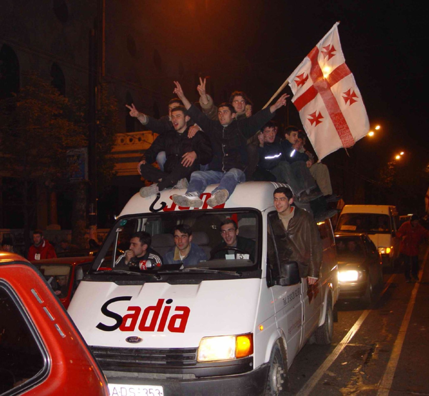 Georgian protesters on a car during the rose revolution in 2003