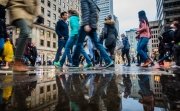 People walking fast during shipping hour on Ste-Catherine Street in Montreal, Canada