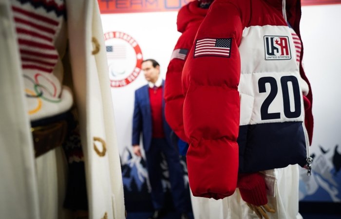 Marco Rubio looking at Team USA uniforms