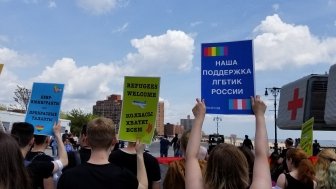 pro-LGBTQ protest signs in Russian