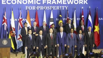 Participants of a summit on the economic initiative called the Indo-Pacific Economic Framework attend a photo session on Nov. 16, 2023, in San Francisco. 