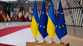 EU and Ukraine Flags on a Podium