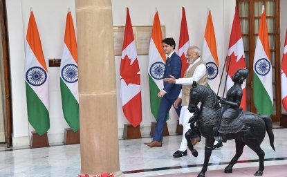 Trudeau and Modi Walking Down a Hall