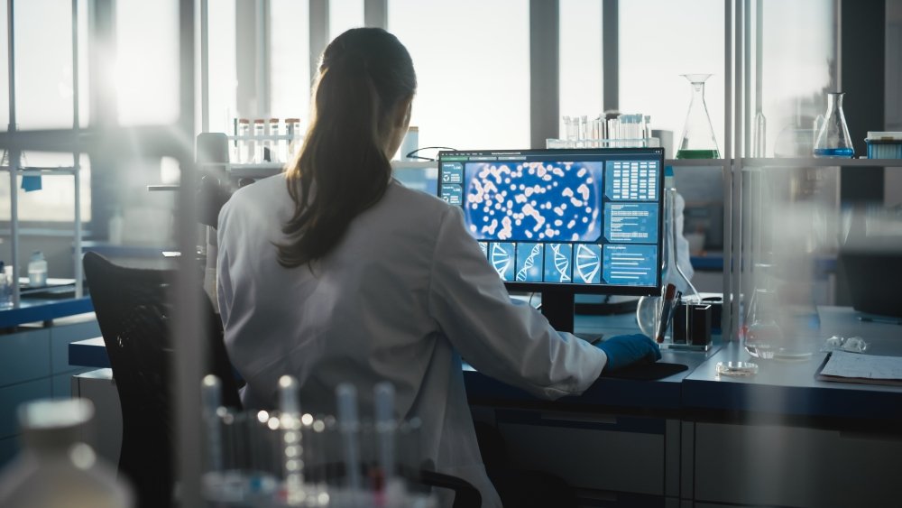 Scientist working on a computer