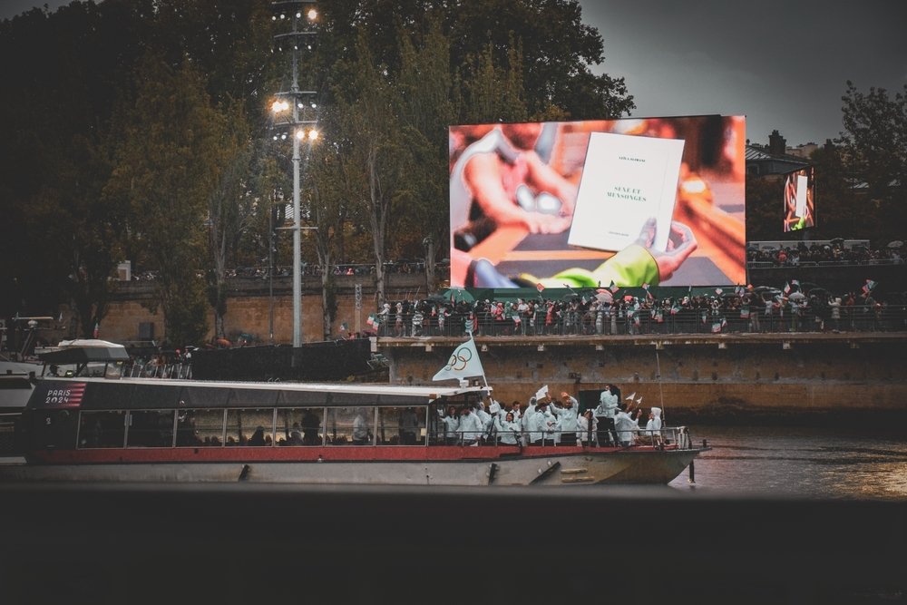 Olympic Refugee Team on the Seine River