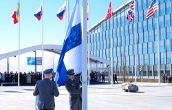 Finland installing Finnish flag at NATO