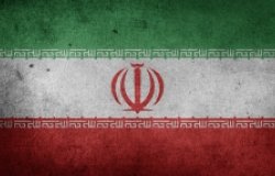 Iranian flag on a dark background
