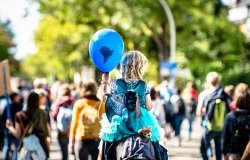 Girl holding balloon