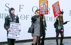 People protesting against unsustainable fast fashion in London