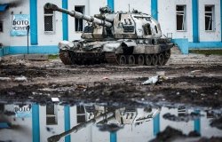 Destroyed Russian self-propelled howitzer 2S19 MSTA on the main square of Trostianets, Ukraine.