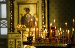 Candles are lit at an Orthodox Church